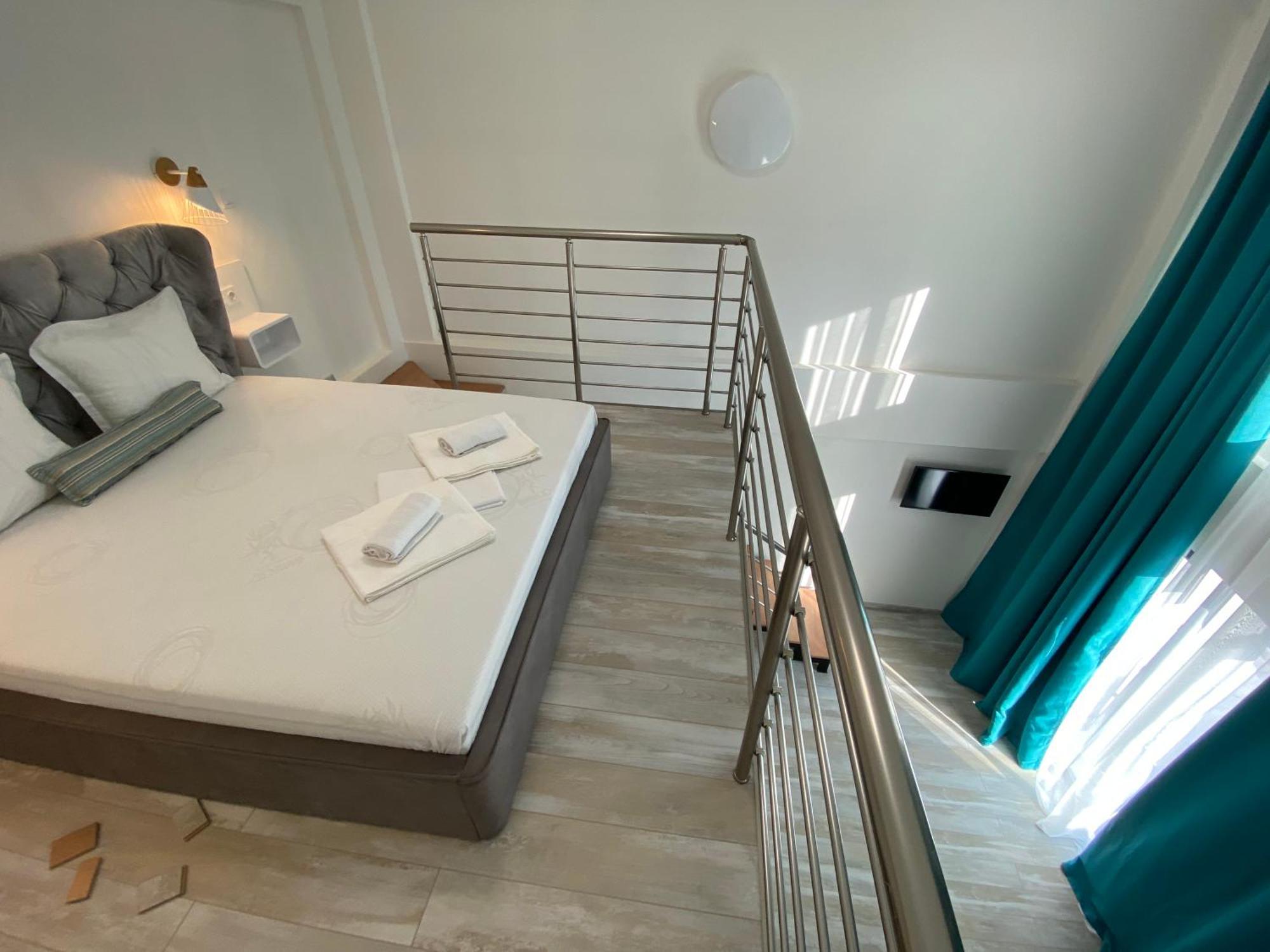 Opalium Beach Front Suites Потос Экстерьер фото