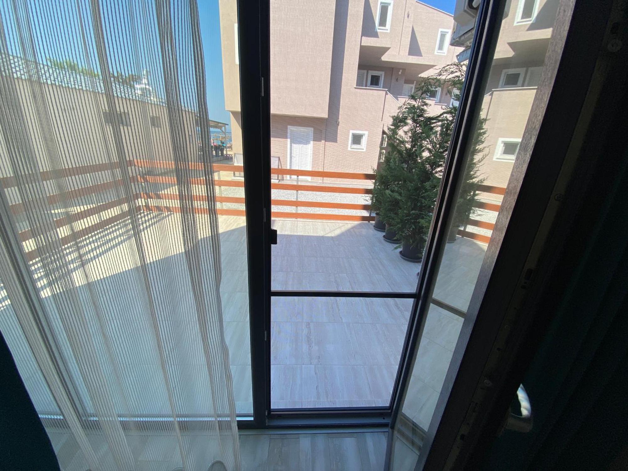 Opalium Beach Front Suites Потос Экстерьер фото
