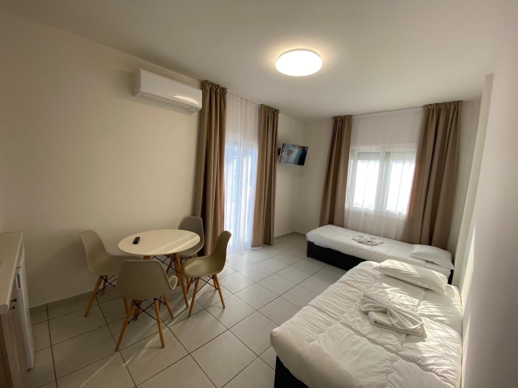 Opalium Beach Front Suites Потос Экстерьер фото