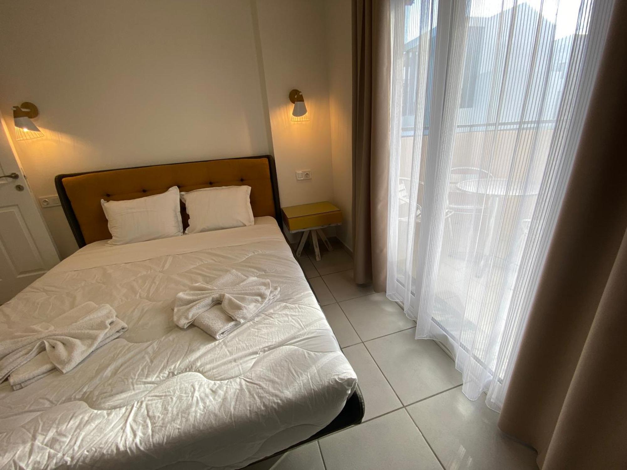 Opalium Beach Front Suites Потос Экстерьер фото